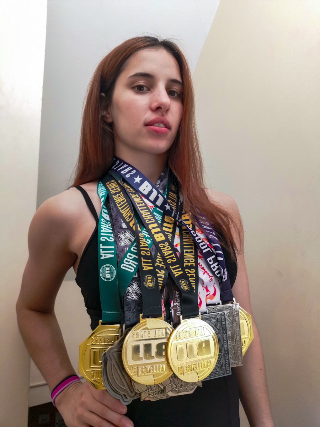 denissa with lots of medals